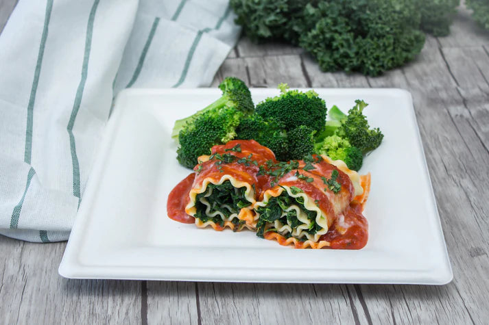 300-piece Compostable eco-friendly dinnerware set for 50 guests. Includes: 100 white square plates & 200 utensils